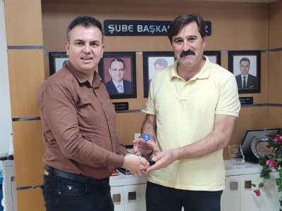 ÜYEMİZE MESLEKTE 25. YIL PLAKETİ TAKDİM EDİLDİ