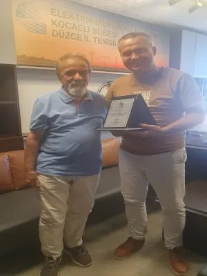 MESLEKTE 50. YIL PLAKET TAKDİMİ YAPILDI